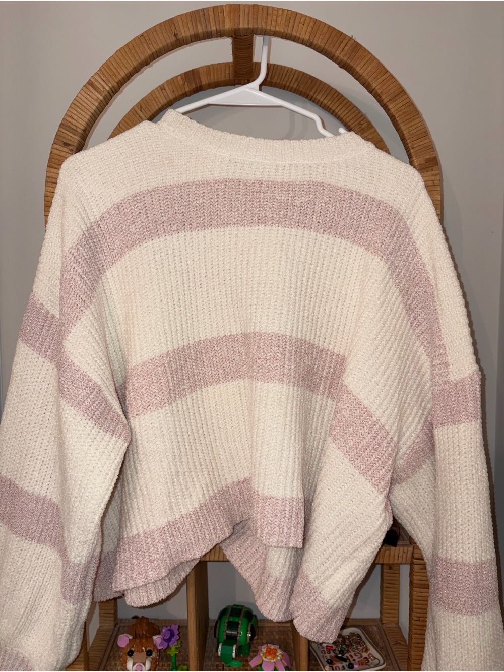 Altar'd State pink and white striped sweater features a chunky knit design
